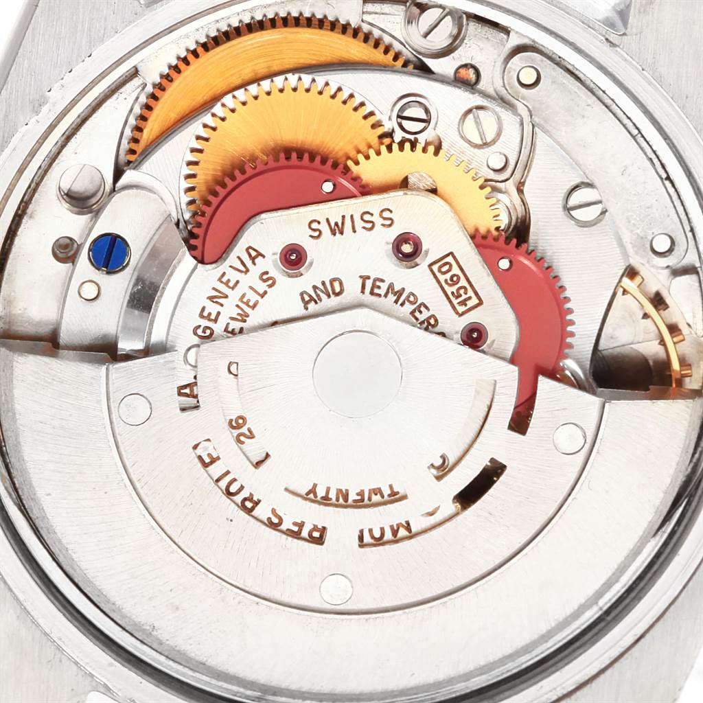 This image shows a detailed view of the inner mechanical movement of the Rolex Vintage Collection 1500 Men's Stainless Steel Silver Dial 1500 Men's Stainless Steel Silver Dial model watch, focusing on the gears and jewels.