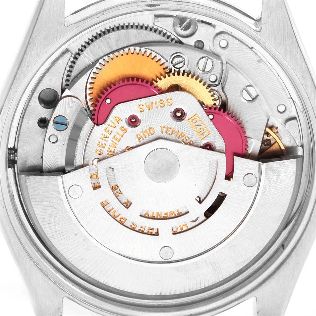 The image shows the intricate internal mechanism of a Rolex Vintage Collection 1002 Men's Stainless Steel Silver Dial 1002 Men's Stainless Steel Silver Dial model, viewed from the back.