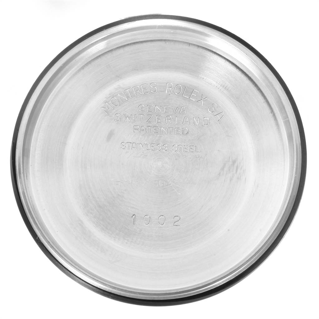 This image shows the case back of a Rolex Vintage Collection 1002 Men's Stainless Steel Silver Dial 1002 Men's Stainless Steel Silver Dial watch, displaying the branding and model number.