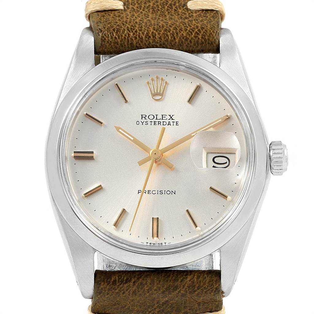 This image shows a front view of a Rolex Vintage Collection 6694 Men's Stainless Steel Silver Dial 6694 Men's Stainless Steel Silver Dial Oysterdate watch with a brown leather strap and date display.