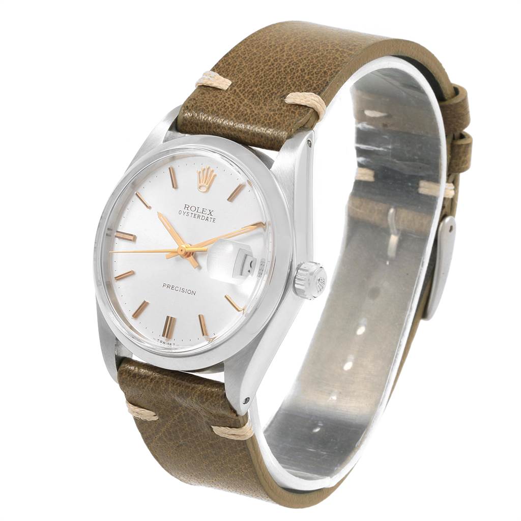 The image shows a Rolex Vintage Collection 6694 Men's Stainless Steel Silver Dial 6694 Men's Stainless Steel Silver Dial watch at a three-quarter angle, highlighting the dial, crown, and brown leather strap.