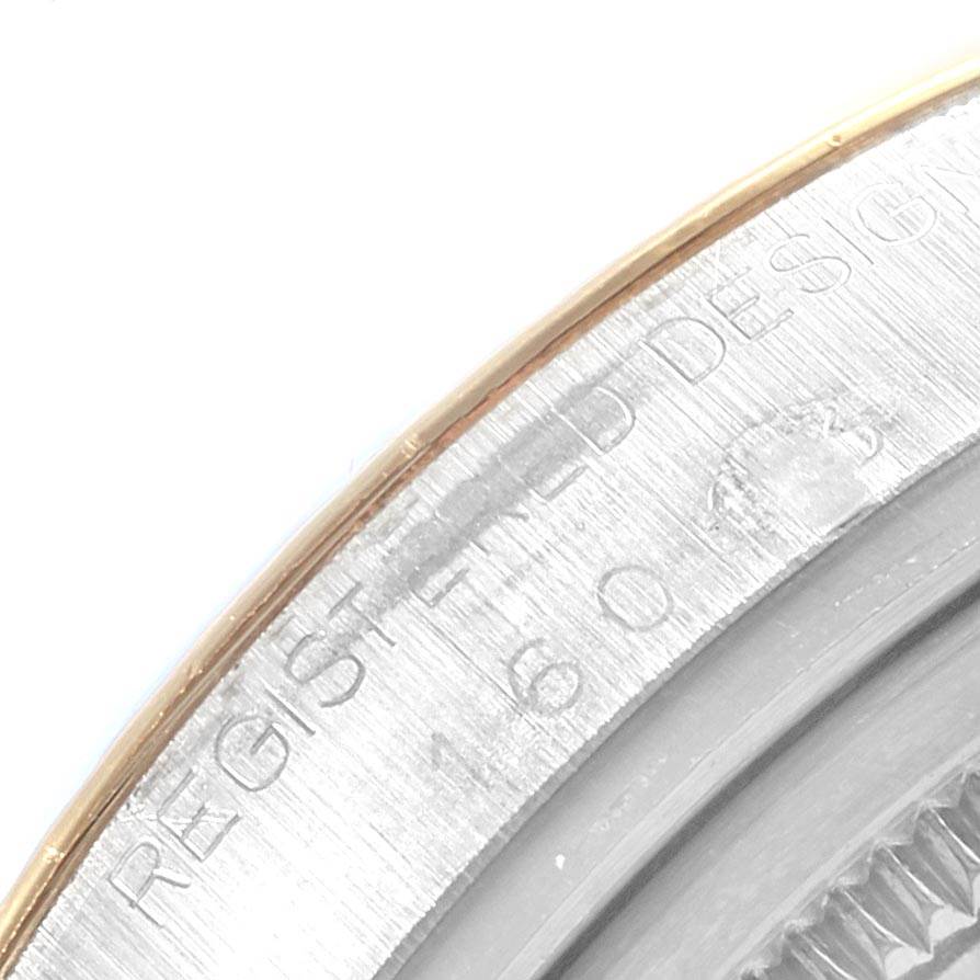 This image shows a close-up of the bezel and part of the case with engravings of a Rolex Vintage Collection 16013 Men's Stainless Steel Black Dial 16013 Men's Stainless Steel Black Dial model.