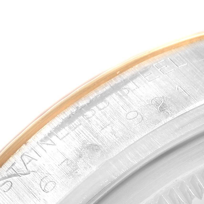 This image shows a close-up of the side and edge of the caseback of the Rolex Vintage Collection 16013 Men's Stainless Steel Black Dial 16013 Men's Stainless Steel Black Dial watch with engraving details visible.