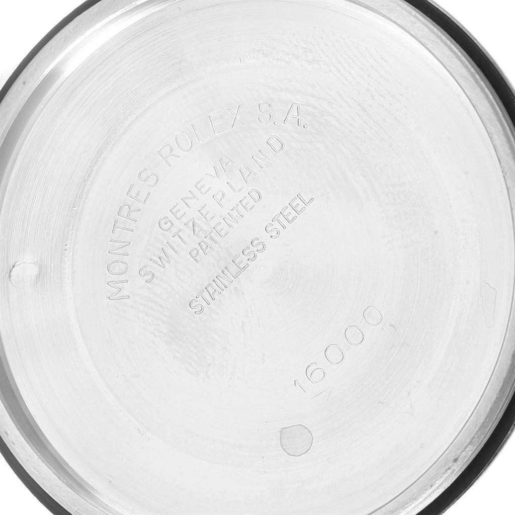 This image shows the inside of the case back of a Rolex Vintage Collection 16013 Men's Stainless Steel Black Dial 16013 Men's Stainless Steel Black Dial watch, model number 16000, with visible engravings.