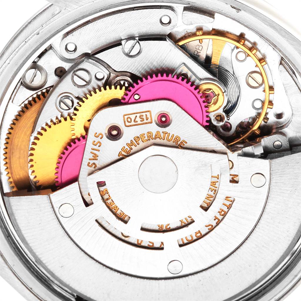 Close-up view of the Rolex Vintage Collection 1500 Men's Stainless Steel Silver Dial 1500 Men's Stainless Steel Silver Dial model showing the intricate mechanical movement parts.