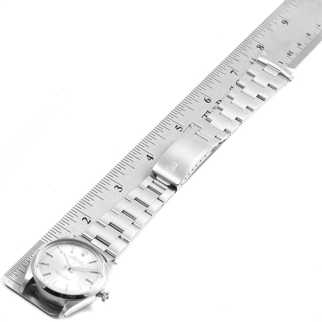 This image shows a Rolex Vintage Collection 1002 Men's Stainless Steel Silver Dial 1002 Men's Stainless Steel Silver Dial watch lying flat, with its bracelet extended and measured against a ruler.