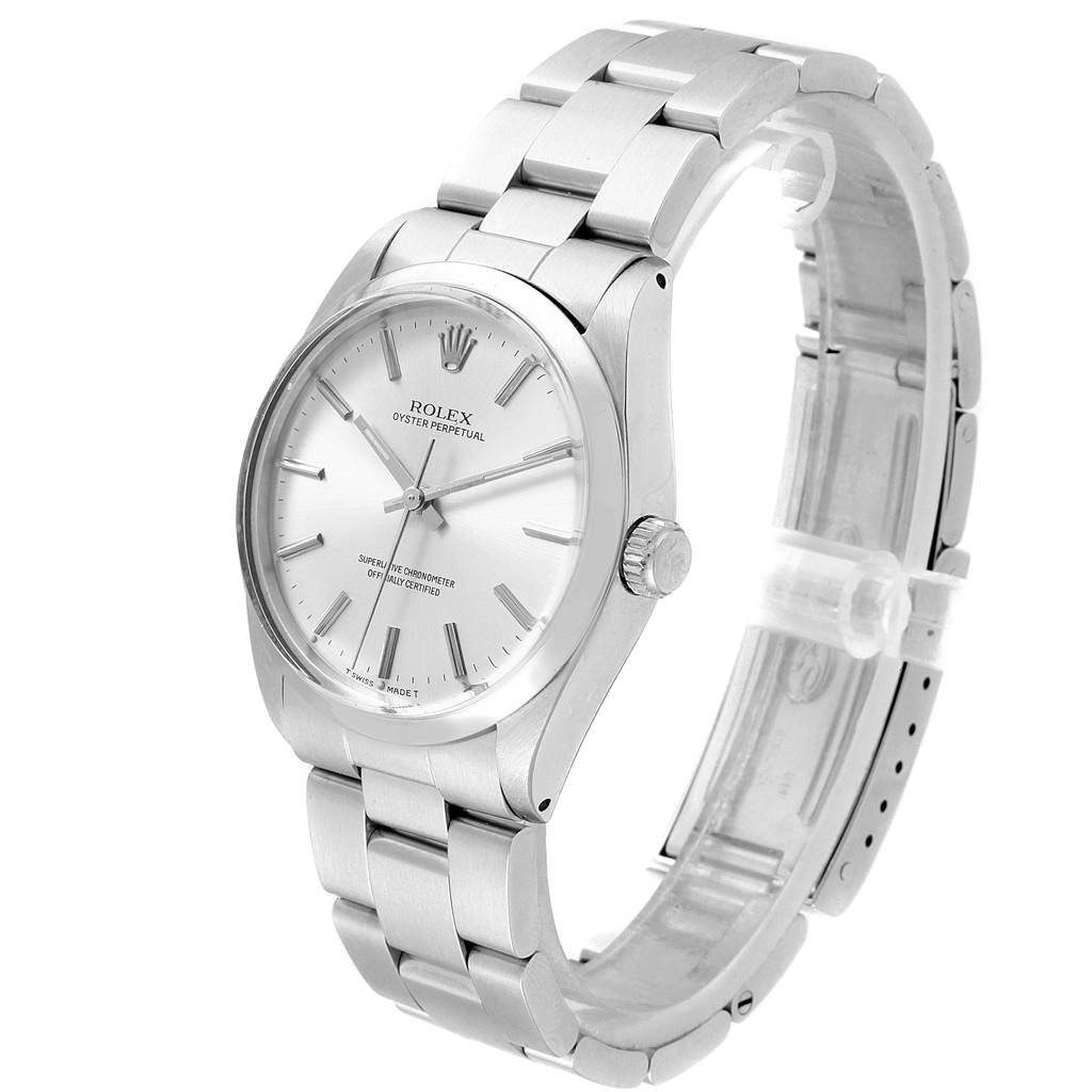 The image shows a side and front angle of a Rolex Vintage Collection 1002 Men's Stainless Steel Silver Dial 1002 Men's Stainless Steel Silver Dial watch, highlighting its face, bracelet, and crown.