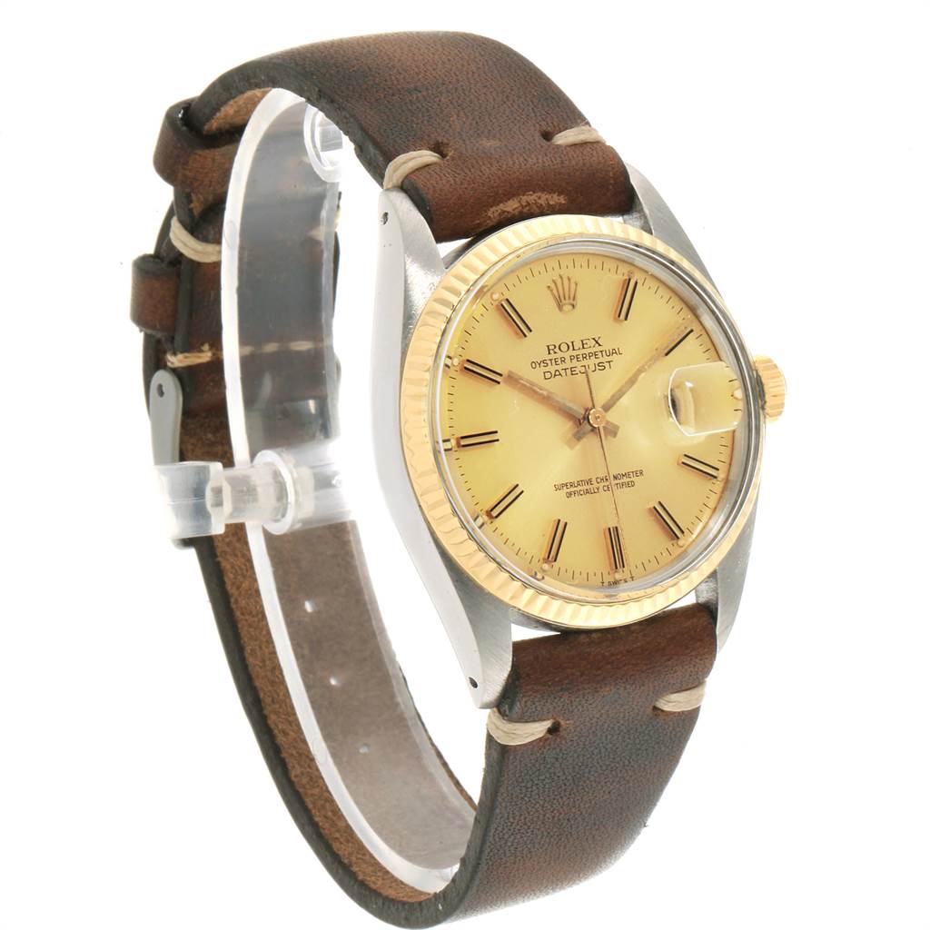 The image shows a Rolex Vintage Collection 16013 Men's Stainless Steel Champagne Dial 16013 Men's Stainless Steel Champagne Dial model watch at a slight angle, highlighting its dial and leather strap.