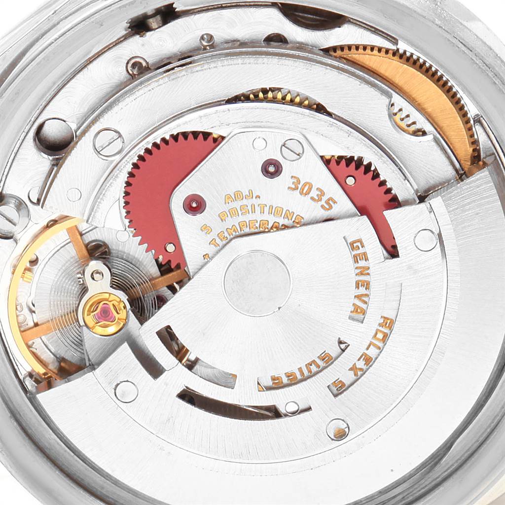 The image shows a close-up view of the internal mechanical movement of a Rolex Vintage Collection 16013 Men's Stainless Steel Champagne Dial 16013 Men's Stainless Steel Champagne Dial watch.