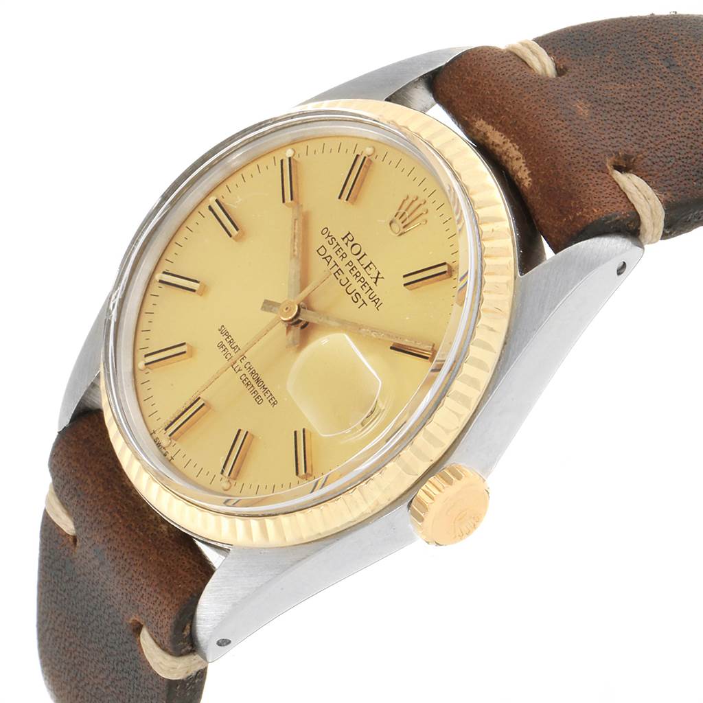 The image shows a close-up of the face and part of the strap of a Rolex Vintage Collection 16013 Men's Stainless Steel Champagne Dial 16013 Men's Stainless Steel Champagne Dial Datejust, angled from the top-right.