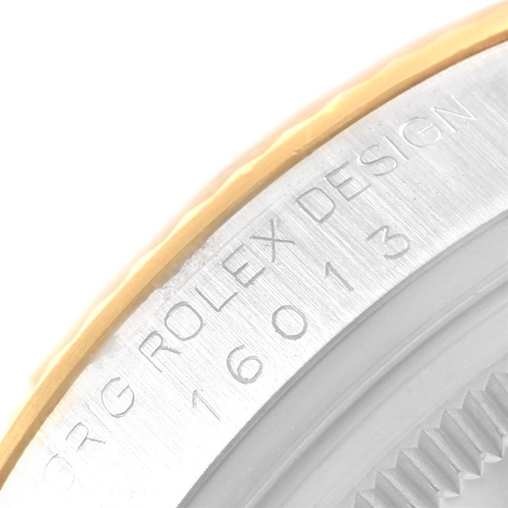 The image shows a close-up of the case and bezel of the Vintage Collection Rolex model 16013.
