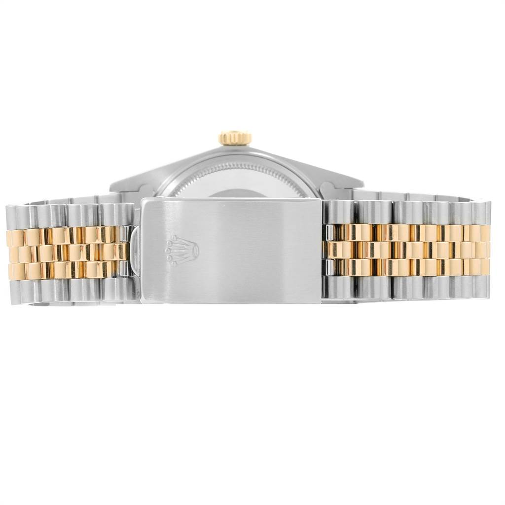 The back view of the Rolex Vintage Collection 16013 Men's Stainless Steel Champagne Dial 16013 Men's Stainless Steel Champagne Dial watch showing the clasp and two-tone bracelet.