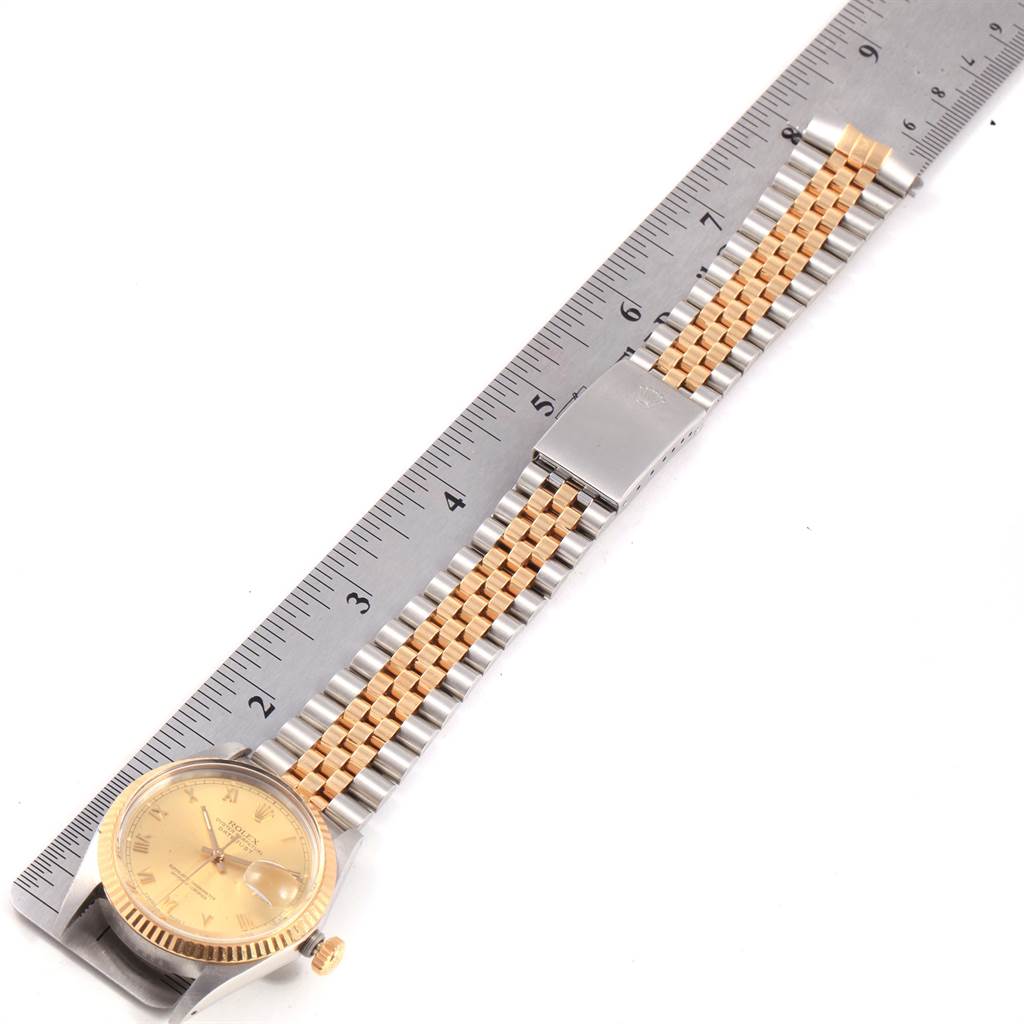 The Rolex Vintage Collection 16013 Men's Stainless Steel Champagne Dial 16013 Men's Stainless Steel Champagne Dial watch is shown from an overhead angle with its face, bezel, and bracelet fully visible.