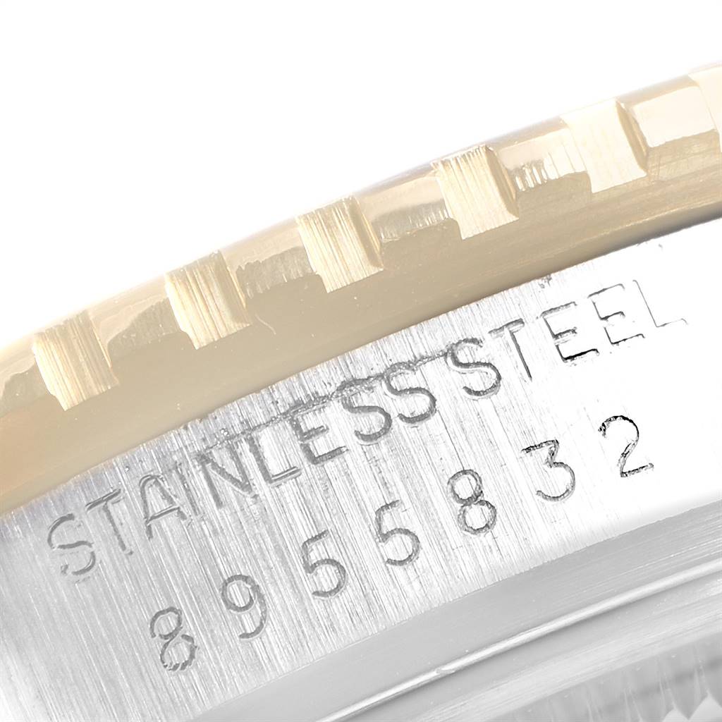 This image shows a close-up of the stainless steel case and engraved serial number of a Rolex Vintage Collection 16253 Men's Steel and Gold (two tone) Champagne Dial 16253 Men's Steel and Gold (two tone) Champagne Dial watch.