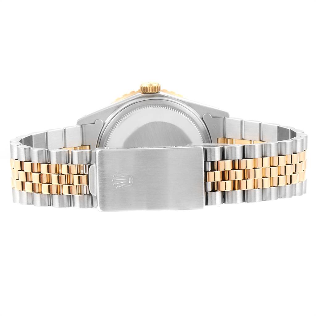 The image shows the back view of a Rolex Vintage Collection 16253 Men's Steel and Gold (two tone) Champagne Dial 16253 Men's Steel and Gold (two tone) Champagne Dial watch, highlighting its two-tone bracelet and clasp.