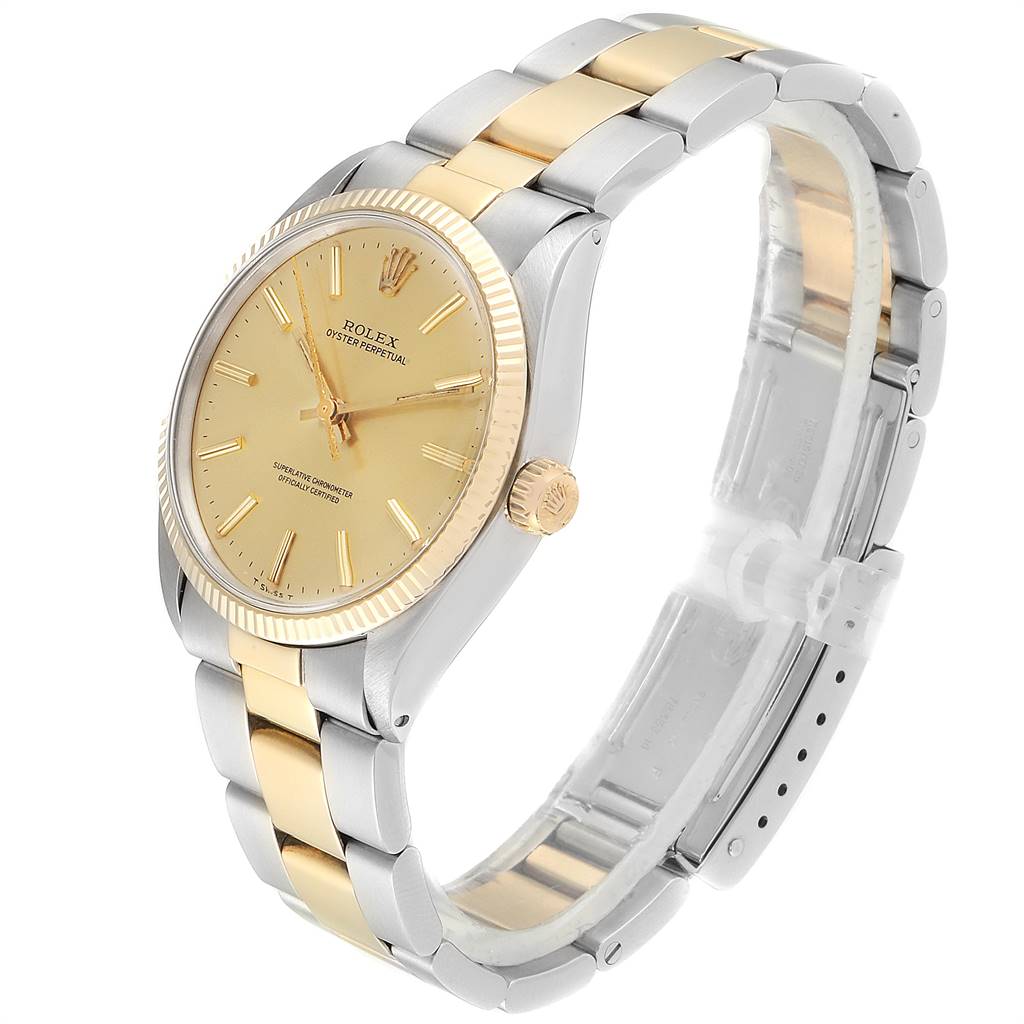 The Rolex Vintage Collection 1005 Men's Steel and Gold (two tone) Champagne Dial 1005 Men's Steel and Gold (two tone) Champagne Dial watch is shown at a three-quarter angle, highlighting the gold dial, bezel, and bicolor bracelet.