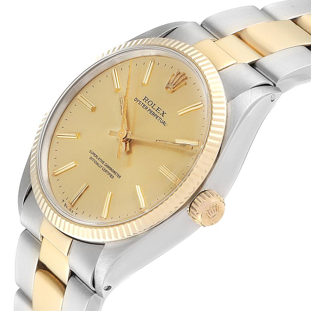 This image shows a side and angled view of the Rolex Vintage Collection 1005 Men's Steel and Gold (two tone) Champagne Dial 1005 Men's Steel and Gold (two tone) Champagne Dial watch, highlighting its gold dial, bezel, and two-tone bracelet.