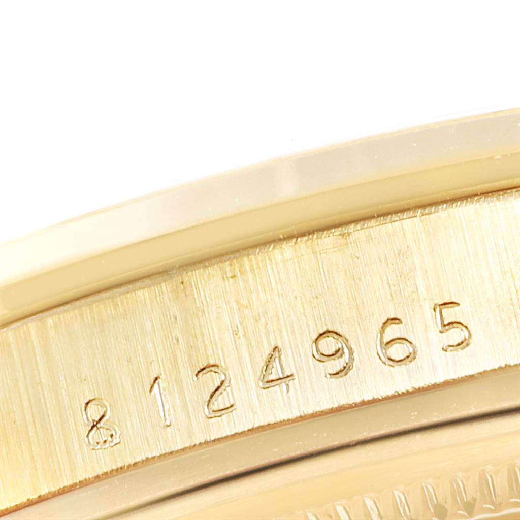 This image shows a close-up of the serial number on the side of a Rolex Vintage Collection 15505 Men's Champagne Dial 15505 Men's Champagne Dial model.