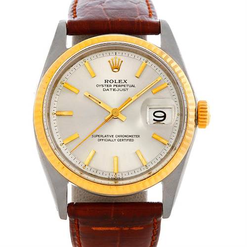 The image shows a front view of the Rolex Vintage Collection 1601 Men's Stainless Steel Silver Dial 1601 Men's Stainless Steel Silver Dial Oyster Perpetual Datejust watch with a gold bezel and brown leather strap.