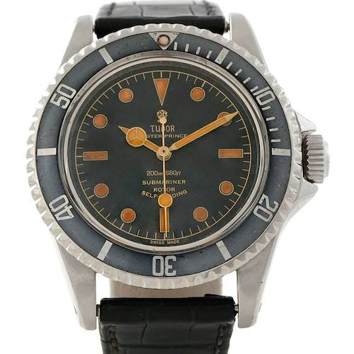 This image shows a front view of a Tudor Submariner 7928 Men's Stainless Steel Black Dial 7928 Men's Stainless Steel Black Dial watch, highlighting its dial, bezel, and leather strap.