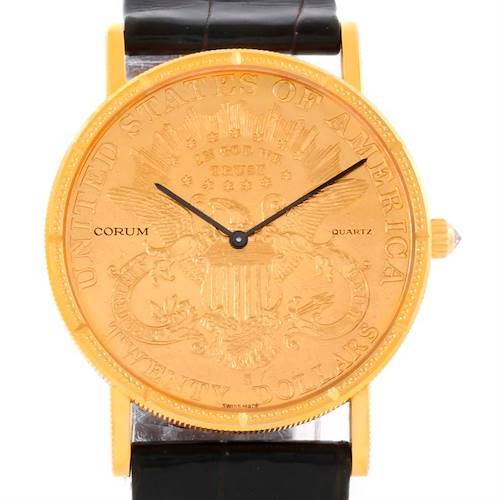 The image shows the dial and strap from a frontal view of a Corum Coin Watch Men's Yellow Gold Black Dial Men's Yellow Gold Black Dial model timepiece.