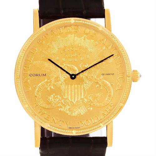 The Corum Coin Watch Men's Yellow Gold Black Dial Men's Yellow Gold Black Dial model is shown from the front, displaying the watch face with detailed engravings and black hands.