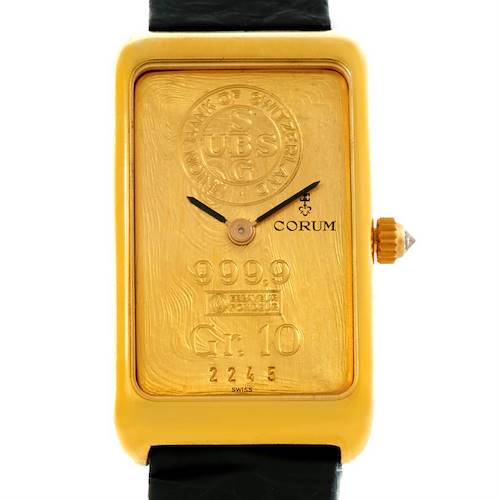 The image shows a front view of the Corum Women's Yellow Gold Champagne Dial Women's Yellow Gold Champagne Dial 18K Yellow Gold 10 Gram Ingot 999.9 Mechanical Ladies Watch, highlighting the dial and brand logo.