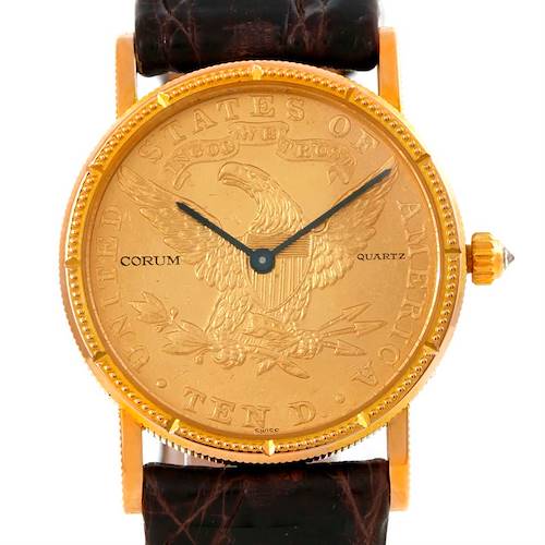 The Corum Women's Yellow Gold Black Dial Women's Yellow Gold Black Dial 22K Yellow Gold 10 Dollars Coin Diamond Ladies Watch is shown from the front, displaying the dial, hands, and part of the strap.