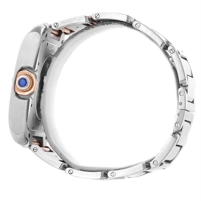 This image shows a side view of the Cartier Tank Anglaise W5310006 Men's Steel and Gold (two tone) Silver Dial W5310006 Men's Steel and Gold (two tone) Silver Dial watch, focusing on the crown and the bracelet links.