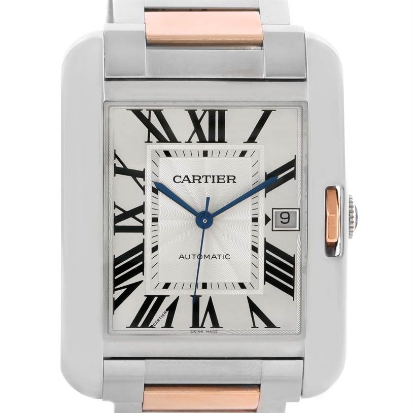 The image shows a close-up front view of the Cartier Tank Anglaise W5310006 Men's Steel and Gold (two tone) Silver Dial W5310006 Men's Steel and Gold (two tone) Silver Dial watch face with a portion of the metallic strap.