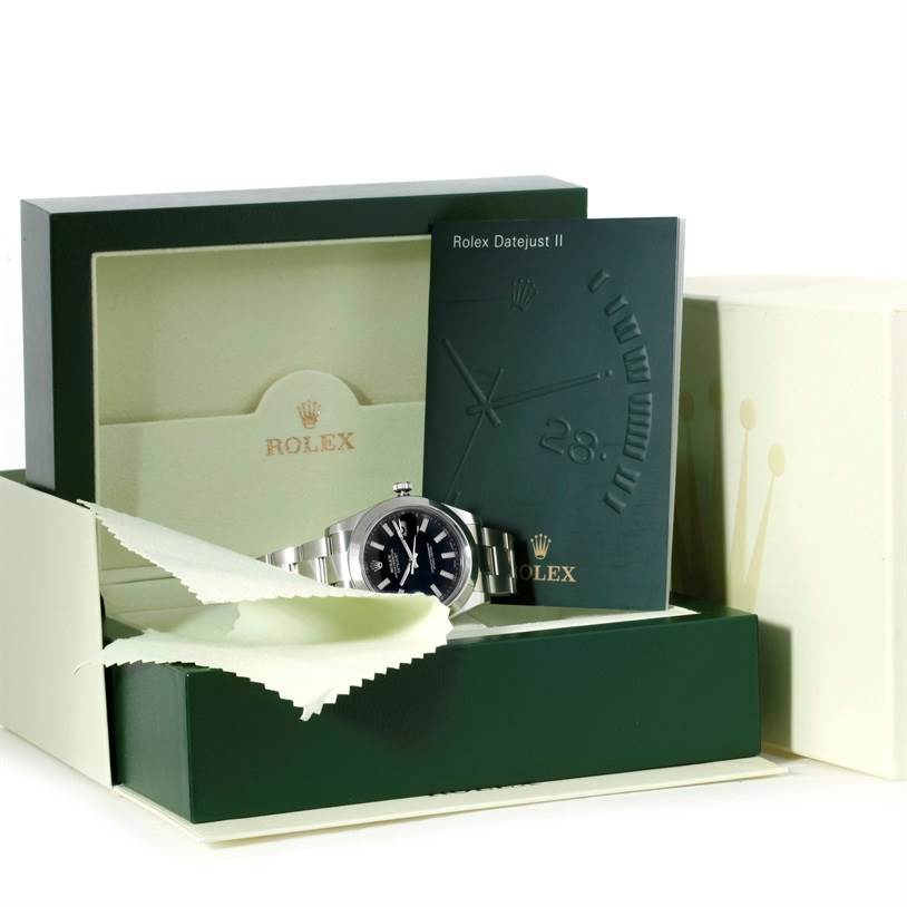 The image shows a Rolex Datejust 41 116300 Men's Stainless Steel Black Dial 116300 Men's Stainless Steel Black Dial watch, displayed with its box, instruction booklet, and cleaning cloth.
