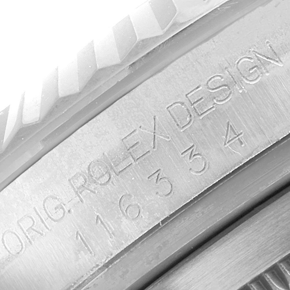 This close-up image of the Rolex Datejust 41 116334 Men's Stainless Steel Blue Dial 116334 Men's Stainless Steel Blue Dial model shows the engraved inner bezel with the brand name and model number.