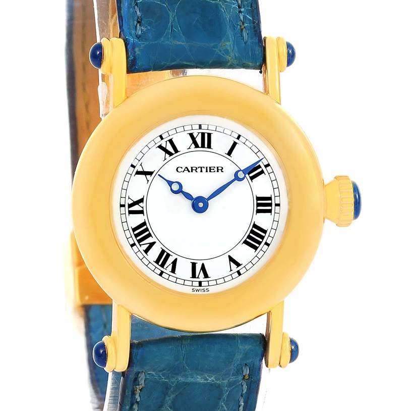 The image shows a front angle of the Cartier Diabolo 1400 Women's Yellow Gold Silver Dial 1400 Women's Yellow Gold Silver Dial watch, highlighting its yellow-gold case, blue strap, and Roman numeral dial.