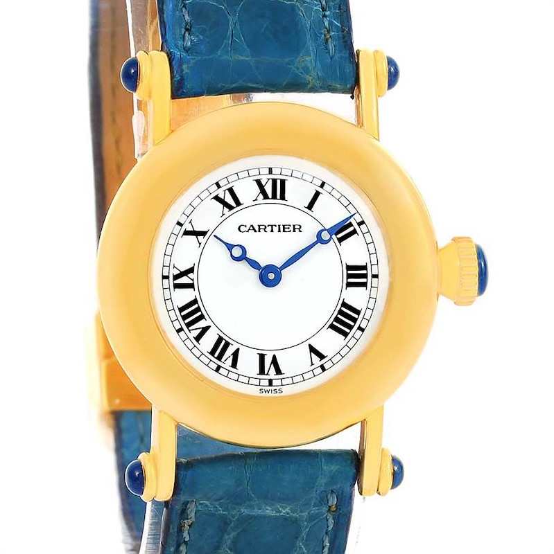 The image shows a front angle of the Cartier Diabolo 1400 Women's Yellow Gold Silver Dial 1400 Women's Yellow Gold Silver Dial watch, highlighting its yellow-gold case, blue strap, and Roman numeral dial.
