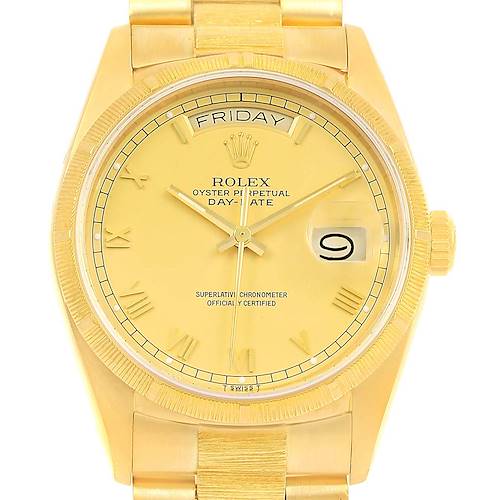 This image shows a frontal view of a Rolex President 18078 Men's Yellow Gold Champagne Dial 18078 Men's Yellow Gold Champagne Dial watch, highlighting the dial, hands, day, and date displays.