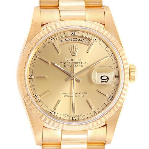 This image shows a close-up of the Rolex President 18238 Men's Yellow Gold Champagne Dial 18238 Men's Yellow Gold Champagne Dial model watch with a focus on its gold dial, day, and date features.