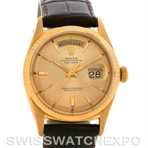This Rolex President 1803 Men's Yellow Gold Champagne Dial 1803 Men's Yellow Gold Champagne Dial model watch is shown from the front, displaying its dial, day, date, bezel, and part of the strap.