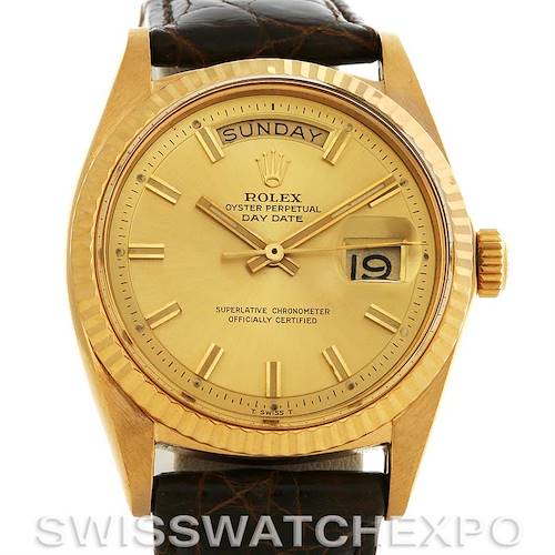 The image shows a Rolex President 1803 Men's Yellow Gold Champagne Dial 1803 Men's Yellow Gold Champagne Dial Day-Date watch with a gold dial, day and date display, fluted bezel, and leather strap from a front angle.
