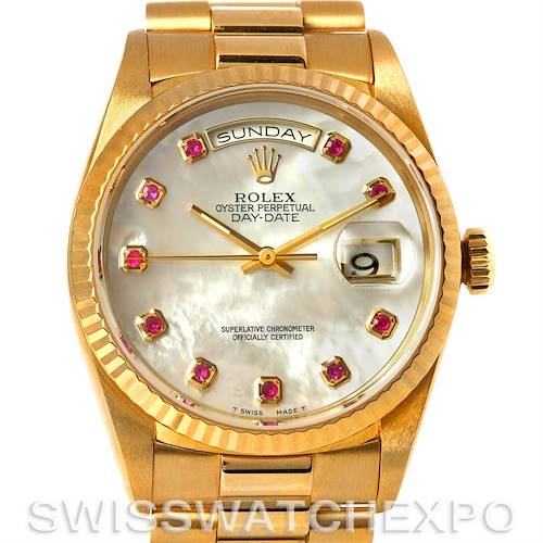 This image shows a Rolex President 18238 Men's Yellow Gold Mother of Pearl Dial 18238 Men's Yellow Gold Mother of Pearl Dial model watch with a gold case, day-date display, and ruby hour markers, viewed from the front.