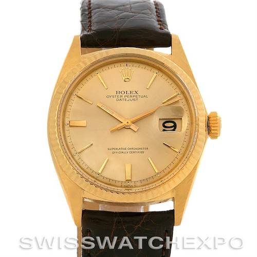 The image shows a front view of the Rolex President 1601 Men's Yellow Gold Champagne Dial 1601 Men's Yellow Gold Champagne Dial Datejust watch with a gold case and brown leather strap.