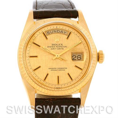 The Rolex President 1803 Men's Yellow Gold Champagne Dial 1803 Men's Yellow Gold Champagne Dial Day-Date watch is shown from a front angle, displaying the dial, hands, day, and date windows, along with its leather strap.