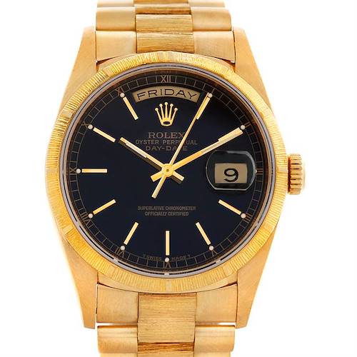 The image shows a frontal view of a Rolex President 18248 Men's Yellow Gold Black Dial 18248 Men's Yellow Gold Black Dial model watch, including the dial, hands, day and date display, and bracelet.
