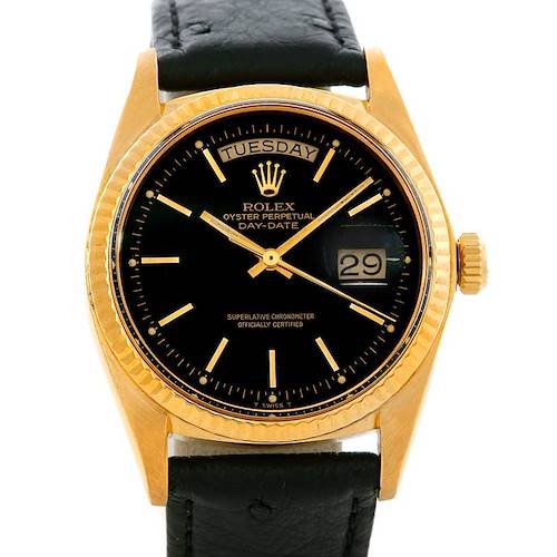 The image shows a frontal view of a Rolex President 1803 Men's Yellow Gold Black Dial 1803 Men's Yellow Gold Black Dial model watch, highlighting its black dial, gold bezel, and leather strap.
