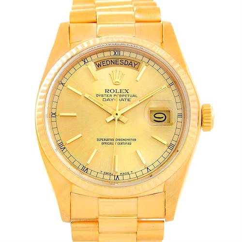 A frontal view of a gold Rolex President 18038 Men's Yellow Gold Champagne Dial 18038 Men's Yellow Gold Champagne Dial Model watch, showing the dial, day-date display, and bracelet.