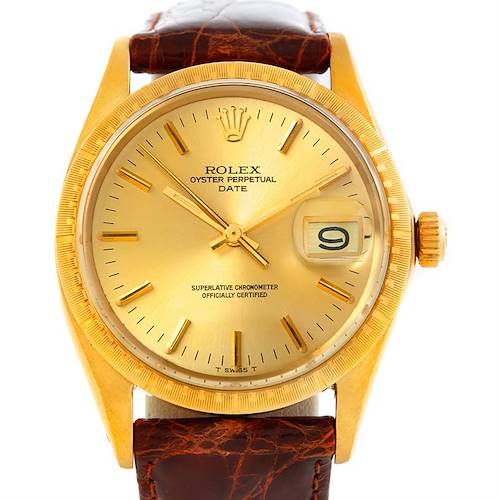 This image shows a front view of a Rolex President 1512 Men's Yellow Gold Champagne Dial 1512 Men's Yellow Gold Champagne Dial model watch, featuring a gold dial, bezel, and leather strap.