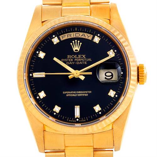 This image shows a front view of a Rolex President 18238 Men's Yellow Gold Black Dial 18238 Men's Yellow Gold Black Dial model watch, highlighting its black dial, day and date display, and gold bracelet.