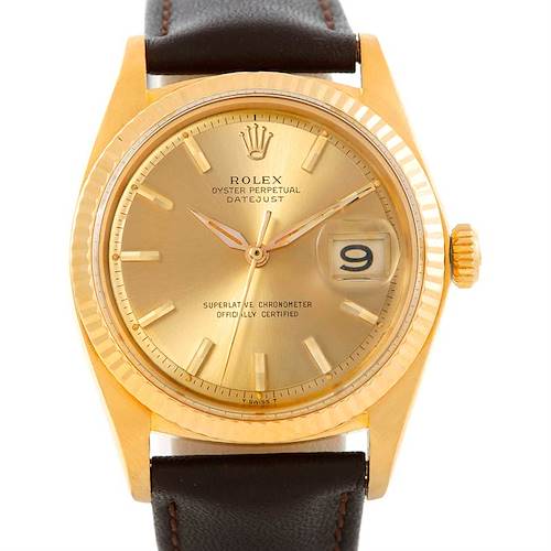 The image shows a frontal view of a Rolex President 1601 Men's Yellow Gold Champagne Dial 1601 Men's Yellow Gold Champagne Dial model watch, featuring the dial, hour markers, and date display.