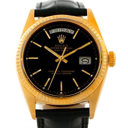 The image shows a front view of a Rolex President 1803 Men's Yellow Gold Black Dial 1803 Men's Yellow Gold Black Dial model watch with a gold case, black dial, day/date display, and black leather strap.