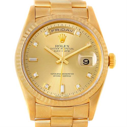 This image shows a close-up of the Rolex President 18238 Men's Yellow Gold Champagne Dial 18238 Men's Yellow Gold Champagne Dial model watch, highlighting the gold dial, day-date display, and bracelet.