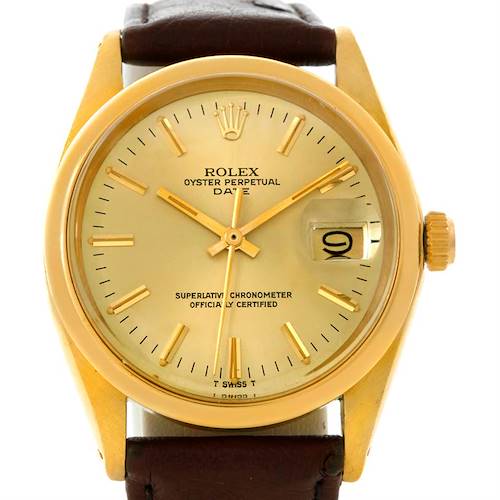 The image shows a front view of a Rolex President 1500 Men's Yellow Gold Champagne Dial 1500 Men's Yellow Gold Champagne Dial model watch with a gold face, gold hands, and a brown leather strap.
